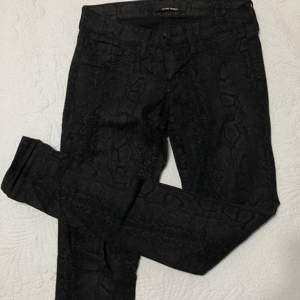 Snake skin skinny jeans
